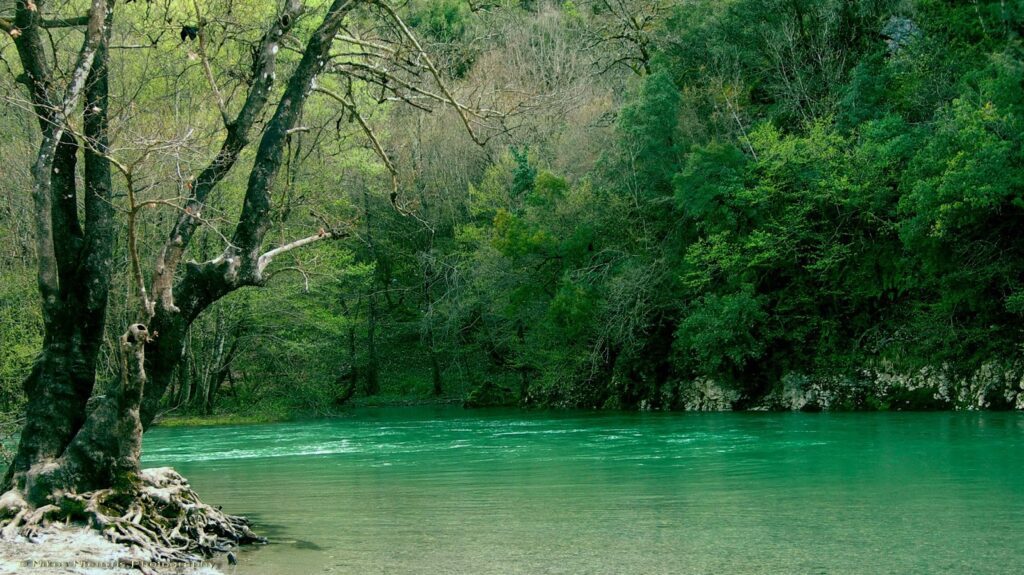Voidomatis River Explore Greece. With crystal clear waters Voidomatis is considered one of the cleanest rivers in Europe. Booking Transfer from Athens.